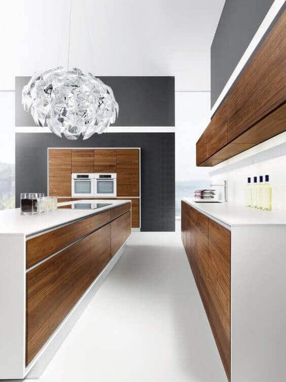 Either you want a modern, a contemporary or a rustic kitchen, you can always opt for dark wood kitchen designs. For more kitchen decor go to thekitchenvibe.com